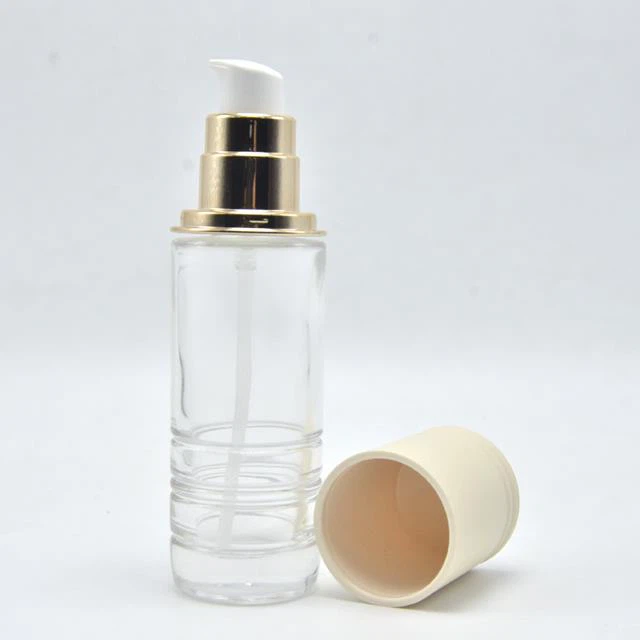 Gold Pump Glass Cosmetic Bottle